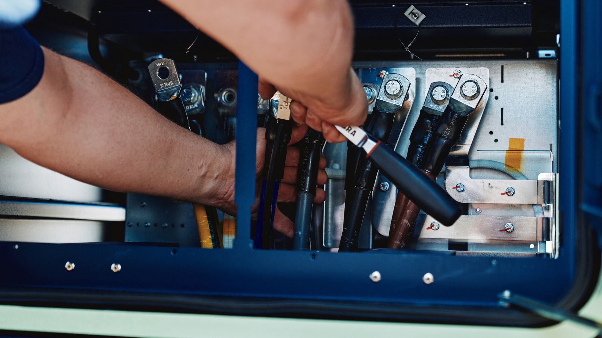 Close-up of the installation of the POWER Charger fast charging station inside