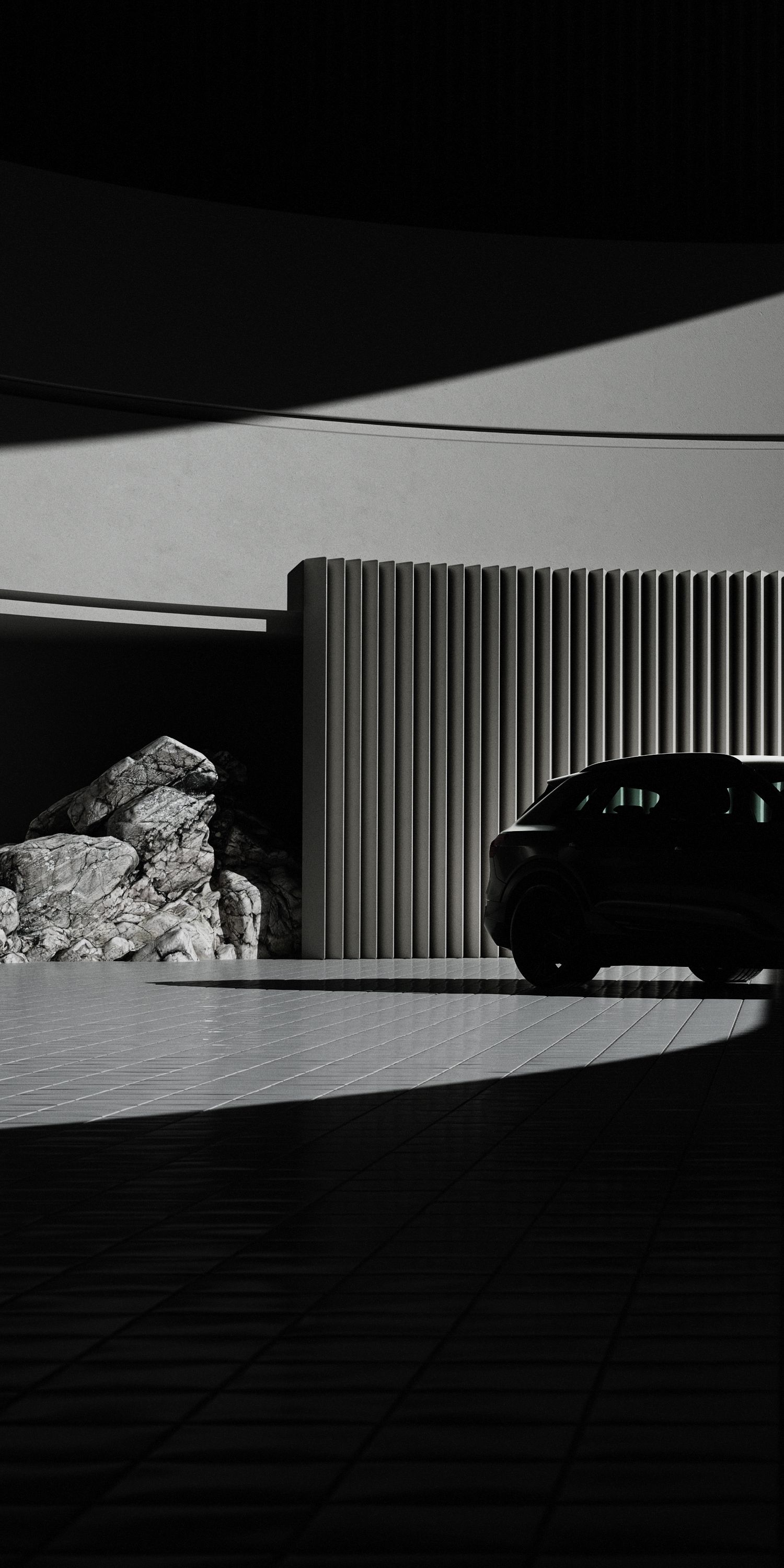 Mașină în fața unui zid